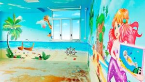 L’ospedale Psichiatrico Gianna Gaslini Inaugura “l’isola Del Tesoro”, L’opera Artistica Di Ospedali Dipinti Che Trasforma La Sala Giochi Del Reparto Di Emato Oncologia Pediatrica.